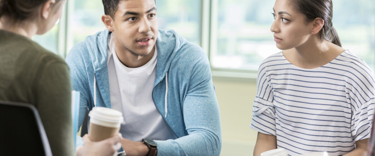 Young adults discuss issues during support group session