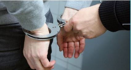 A person in handcuffs