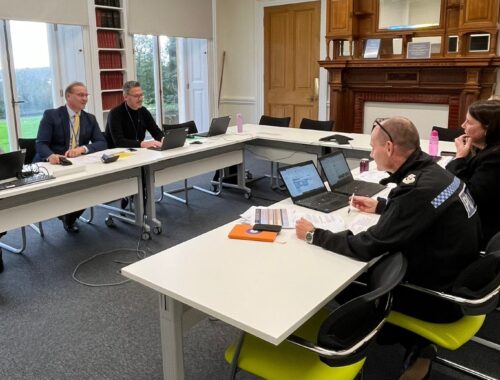 PCC John Campion and DPCC Marc Bayliss sat at a table opposite Chief Constable Pippa Mills and Deputy Chief Constable Alex Murray