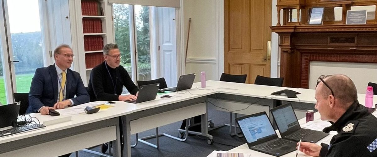 PCC John Campion and DPCC Marc Bayliss sat at a table opposite Chief Constable Pippa Mills and Deputy Chief Constable Alex Murray